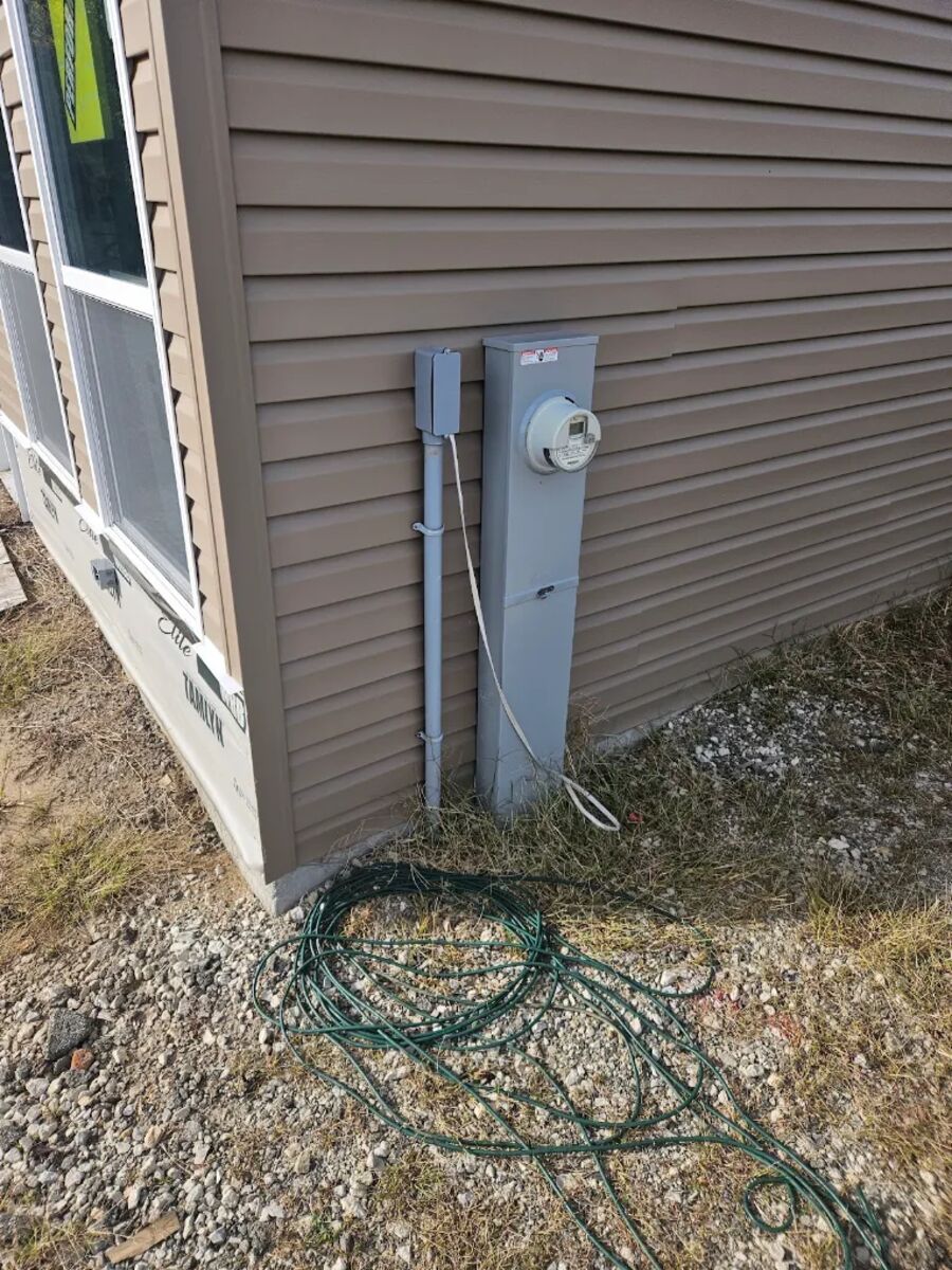 New electrical meter and service installation on a Henry County home