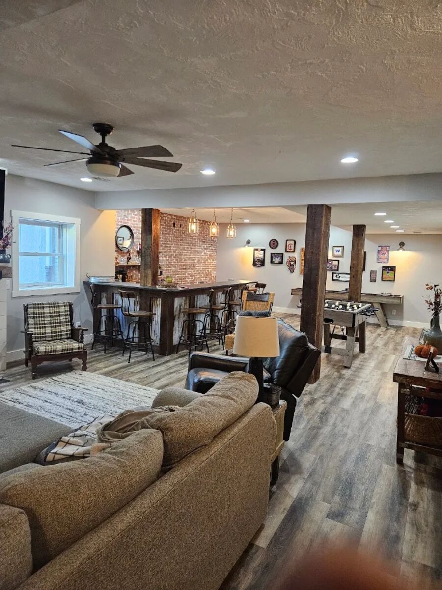 Room Addition Wiring — Open finished basement with ceiling fan and recessed lights installed by RP Electric