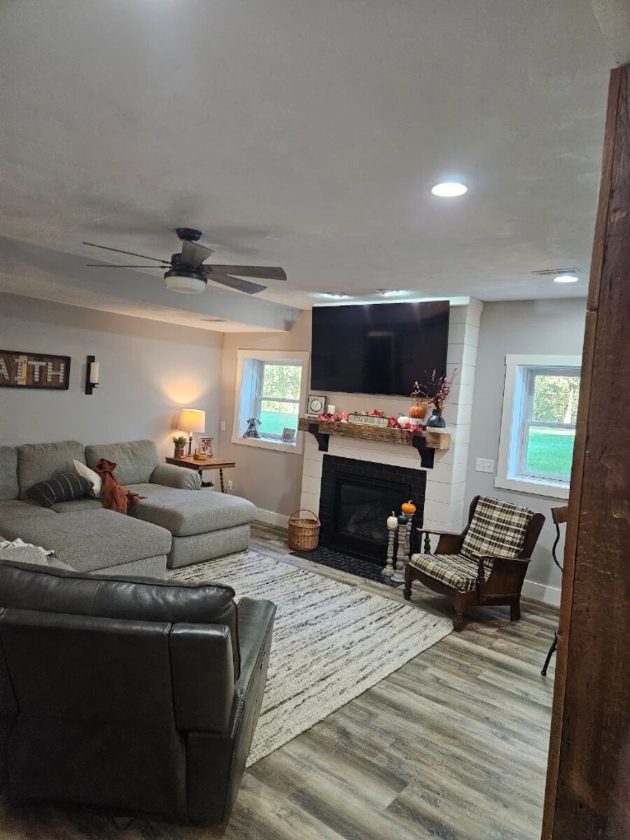 Living room with ceiling fan, recessed lighting and TV wiring by a Geneseo electrician